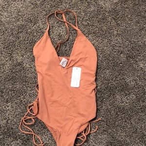 Small lace up one piece